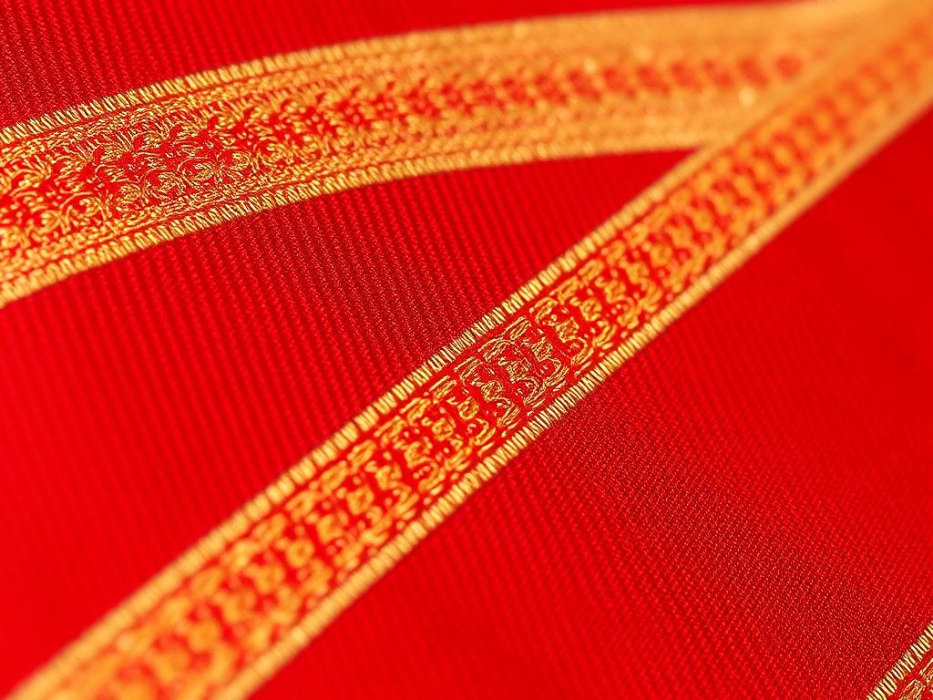 Detail of a Banarasi brocade with dense gold zari patterning