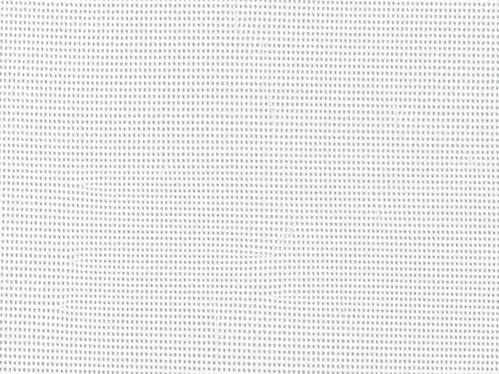 Macro view of a woven cotton fabric surface showing yarn structure